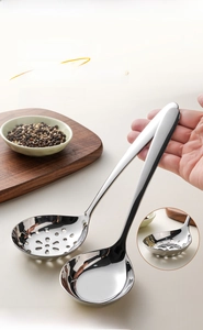 Close-up of polished 304 stainless steel flat bottom soup spoon and slotted spoon set