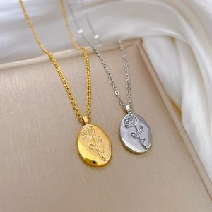 Titanium steel oval rose embossed pendant necklace in gold and silver finishes