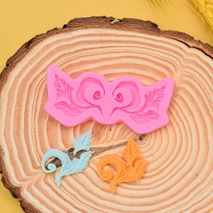 Macro detail of leaf and vine scroll silicone mold for cake borders and clay