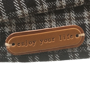 British style checkered beret with brown leather label and enjoy your life inscription