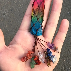 Handheld seven chakra rainbow crystal pendant with woven mesh and natural stone tassels