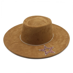 Brown faux suede flat top wide brim hat featuring rhinestone star badge and crystal band