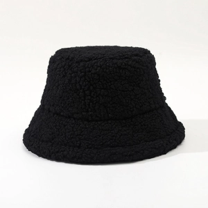 Detailed view of the soft black faux shearling texture on this winter bucket hat