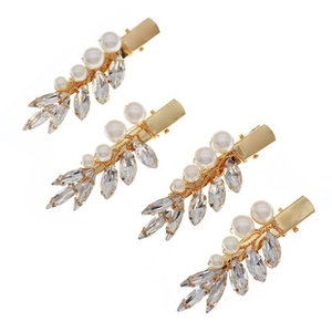 Detail view of 4-piece gold metal hair clip set with faux pearls and marquise crystals