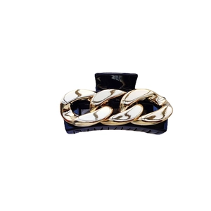 Vintage navy hair claw clip featuring chunky gold metal chain detail on white background