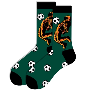 Detail view of green mid-calf socks with astronaut playing soccer pattern and black trim