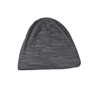 Detail of dark grey heather texture on a breathable cotton knit slouchy beanie hat