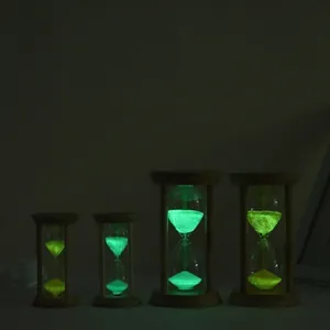 Luminous hourglass timer set with wooden frame and fluorescent sand for home decor