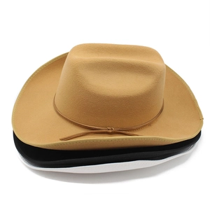 Detailed stack of camel, black, and white felt cowboy hats with slim leather cords