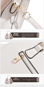Close-up of durable golden hardware and smooth zipper on a color-block leather handbag