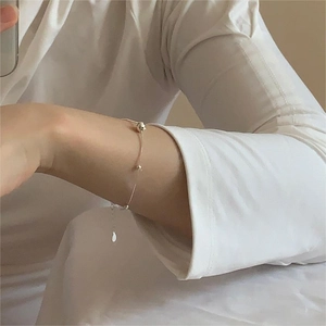 Minimalist S925 sterling silver beaded snake chain bracelet worn on a female wrist
