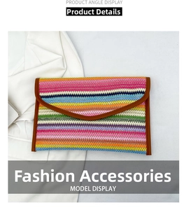 Detail of colorful striped straw envelope clutch with brown leather trim on white background