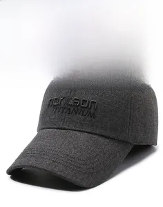 Close-up of the grey tweed baseball cap with high-quality letter embroidery and stiff brim