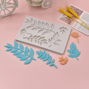 Silicone mold with rose and leaf designs for DIY cake decorating and resin crafting