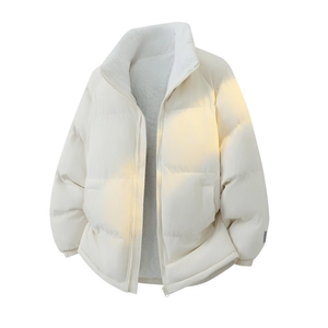 Detail of off-white puffer jacket with warm sherpa fleece lining and stand-up collar