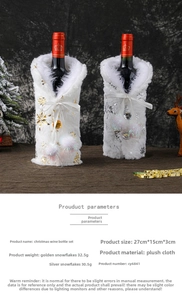 Detail view of plush white Christmas wine bottle covers with gold and silver snowflakes