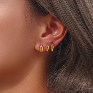 Macro detail of 18K gold plated soda cup earrings with micro-inlaid colorful crystals