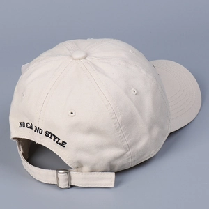 Off-white cotton baseball cap with NO CA NO STYLE embroidery and adjustable metal buckle