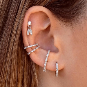 Sparkling zircon 18k gold plated geometric ear cuff set worn on a model ear