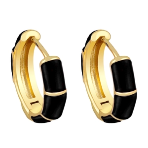 Elegant gold bamboo hoop earrings with black enamel inlay, minimalist geometric jewelry