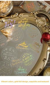 Détails des stickers de Noël en PET avec dorure à l'or et lettrage Joyeux Noël sur plateau