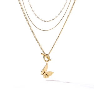 Layered gold titanium steel necklace featuring a butterfly pendant and OT toggle clasp