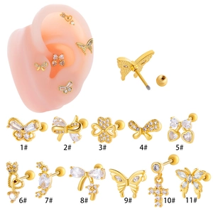 Golden butterfly and heart cartilage earrings set with cubic zirconia stones
