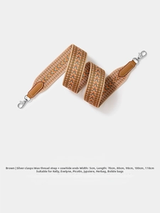 Detail of 5cm wide Bohemian style woven shoulder strap with silver hooks and leather ends