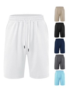 Detail view of men's striped waffle knit leisure shorts in six assorted colors with drawstring