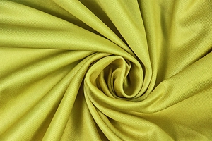 Detailed view of lime green ribbed knit fabric texture with elegant draping and subtle sheen