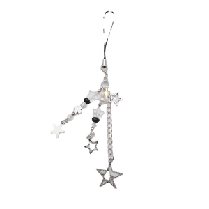 Y2K style silver metal phone charm with star and cross pendants on white background