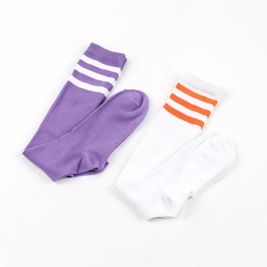Detailed knit texture of purple and white three-stripe knee-high cotton blend socks