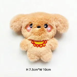 Detail of cute brown plush puppy with embroidery details, H 7.5cm x W 10cm size view