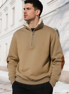 Detail of men's khaki half-zip sweatshirt with fleece lining and elbow patches