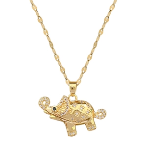 Luxurious gold elephant necklace with sparkling crystals on a clean white background