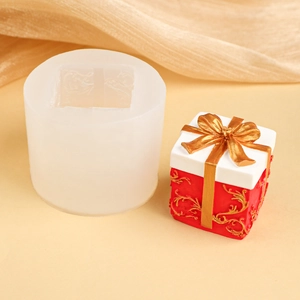 DIY silicone mold for gift boxes with red finished product and golden ribbon accents