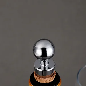 Zinc alloy wine stopper with a polished metal ball top and natural cork seal base