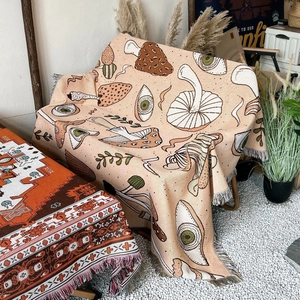 Bohemian mushroom and eye pattern woven camping blanket with decorative fringe