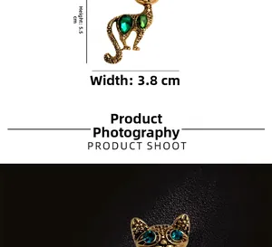 Detailed view of vintage cat brooch with green crystals measuring 5.5cm by 3.8cm