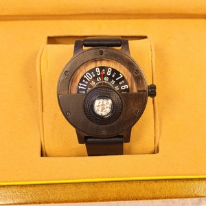 Outdoor wooden watch with leather strap and built-in compass in a yellow gift box