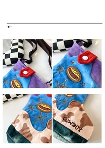 Detail view of colorful plush bag featuring star embroidery and the Vanwalk logo plaque