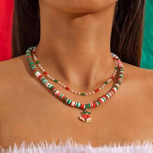 Double-layer Christmas necklace with red and green glass beads and a festive bell pendant