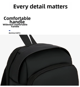 Detail of the widened comfortable carry handle and smooth zipper on the black chest bag