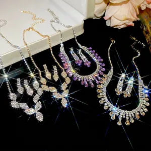 Luxurious teardrop fringe necklace and earring sets with sparkling rhinestones in four styles
