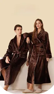 Detail of soft brown coral fleece shawl collar on thick flannel couple's bathrobe