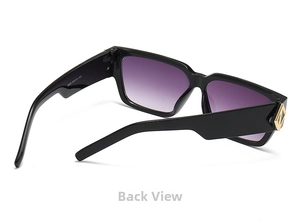 Close-up of hip-hop square sunglasses with gold diamond accent and purple gradient lens
