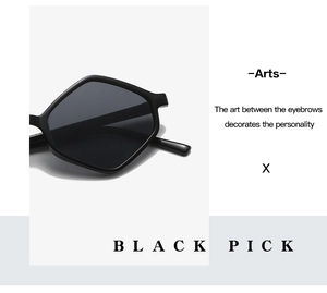 Detail of black geometric diamond sunglasses with stylish polished frame and dark lenses