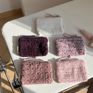 Set of five colorful tweed mini pouches for coins and lipsticks with zipper detail