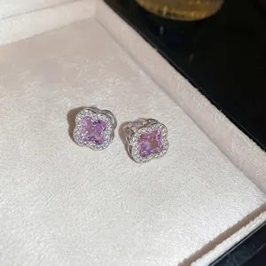 Pink zircon clover earrings with sparkling crystal accents in a luxury gift box