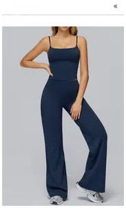 Detail of badge blue yoga set featuring a square neck tank top and flared high waist pants
